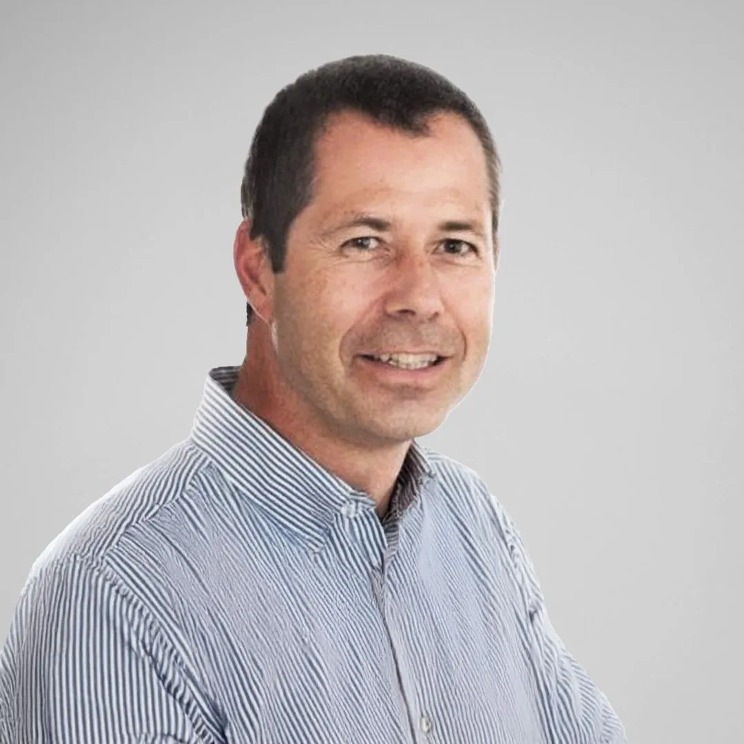 Paddy Roberts, head of governance, risk and compliance at Augment Code and author of this article on agentic code review and SOC 2 Type 2, in a studio portrait