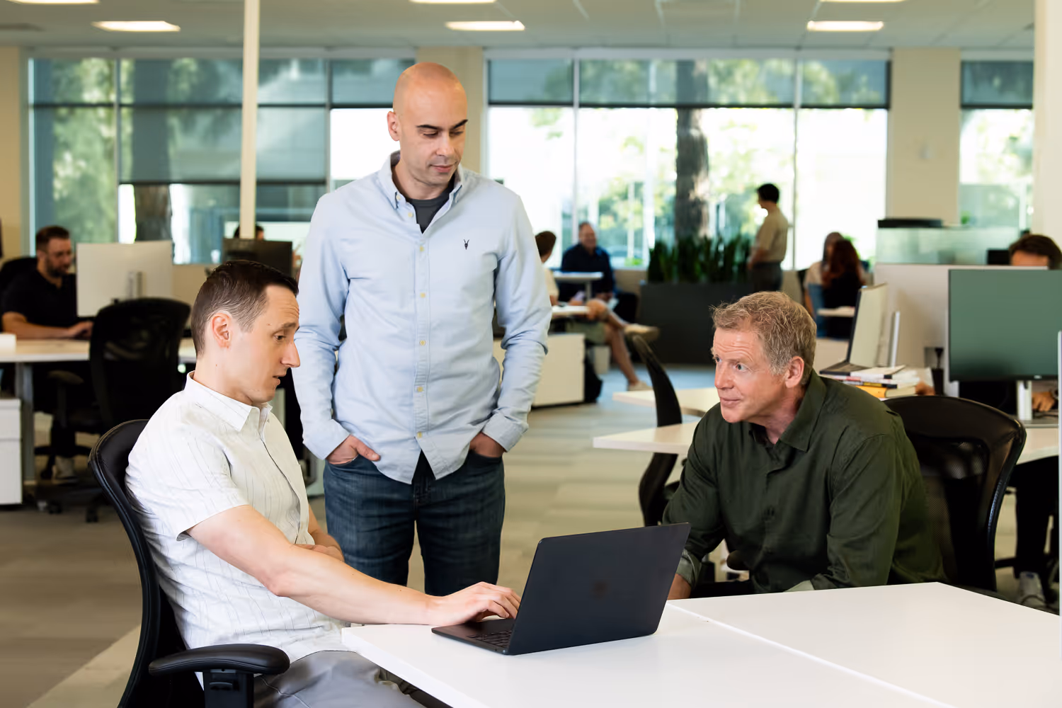 The Augment Code team collaborating at their San Francisco office.