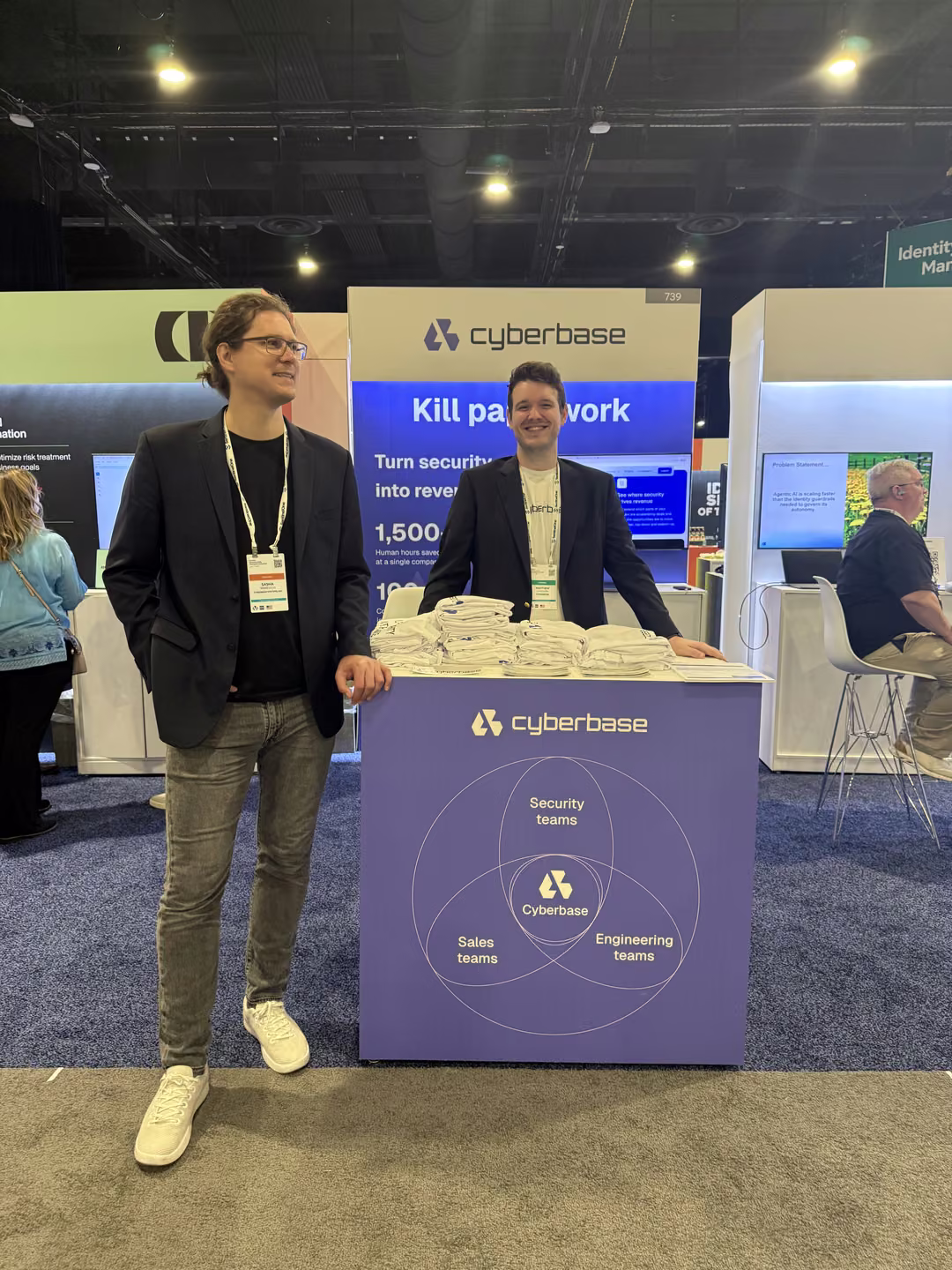 Two YSecurity team members at the Cyberbase booth on the expo floor of the Gartner Security and Risk Management Summit 2026 at National Harbor