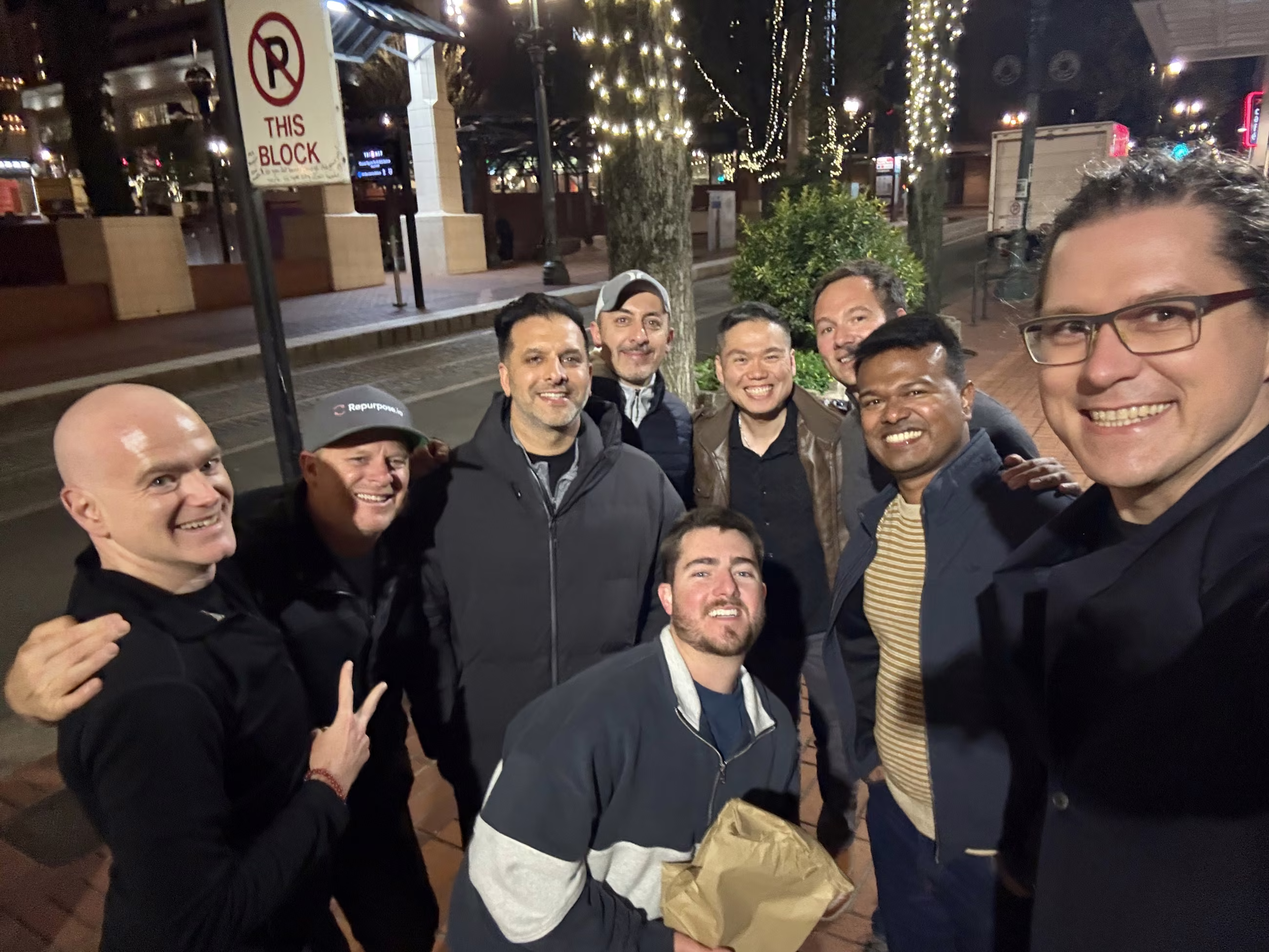 A group of founders out on a Portland street at night