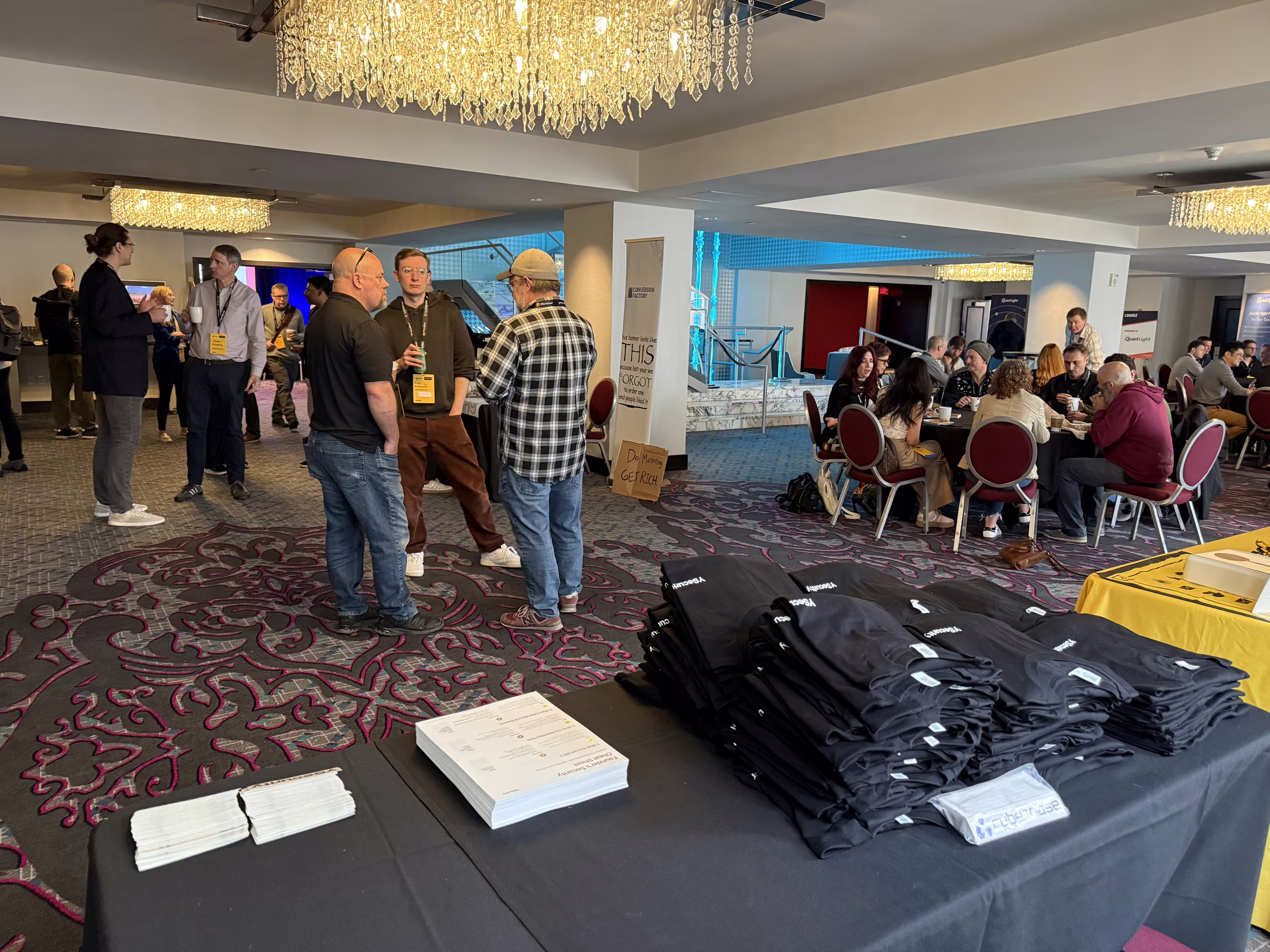 T-shirt table under the ballroom chandelier before doors