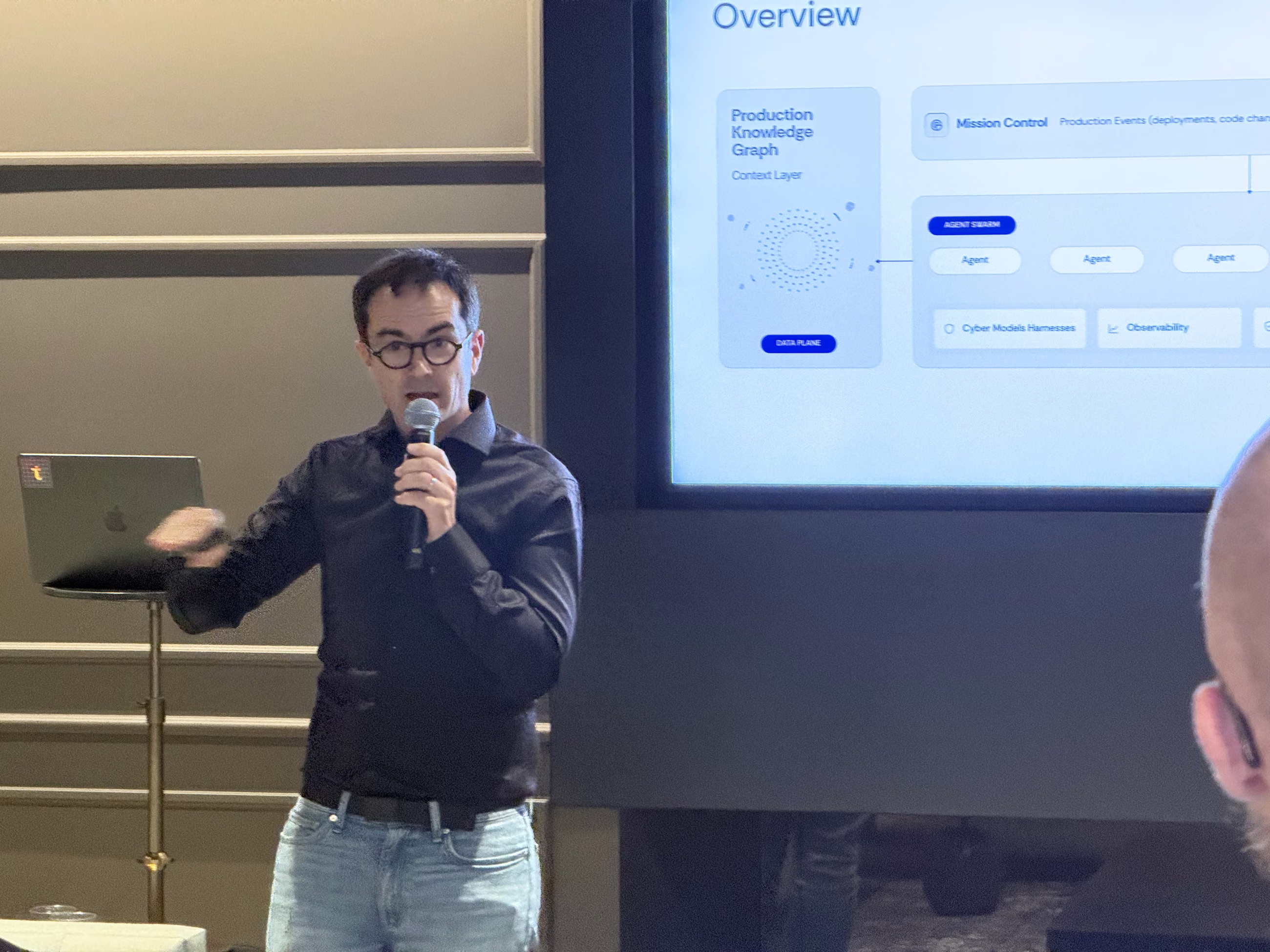 Jean-Baptiste Aviat presenting Tolmo’s platform overview slide, with the production knowledge graph and mission control