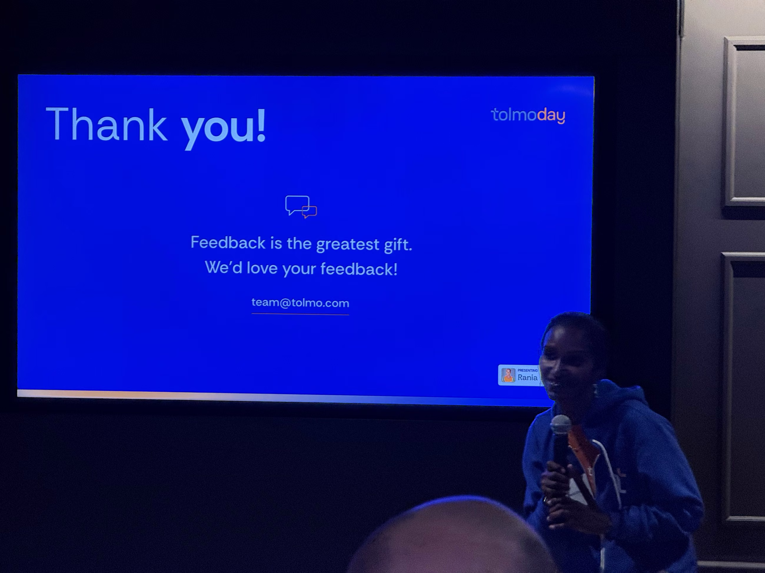 Rania Eltom of Tolmo closing the evening in front of a “Thank you! Feedback is the greatest gift” slide